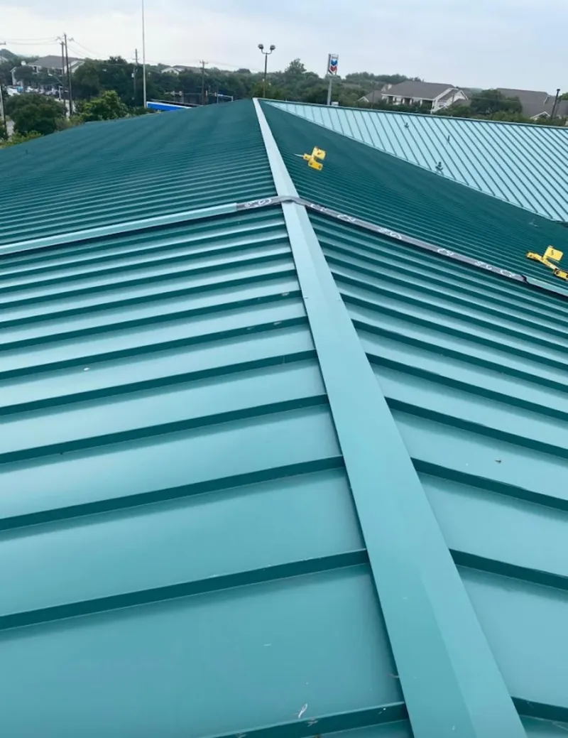 Green commercial metal roof ridge and valley for Metal Roof Repair in Montevideo