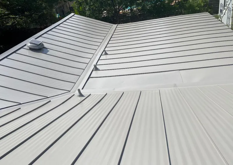 Solar attic fan installed on a metal roof for Roof Ventilation in Montevideo